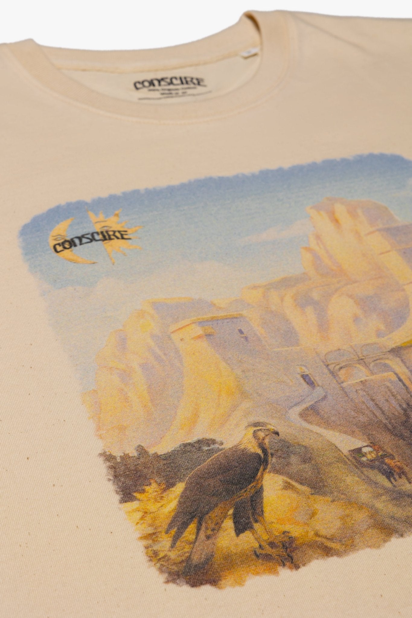 Close-Up Shot of Cream T-Shirt with Artwork Print