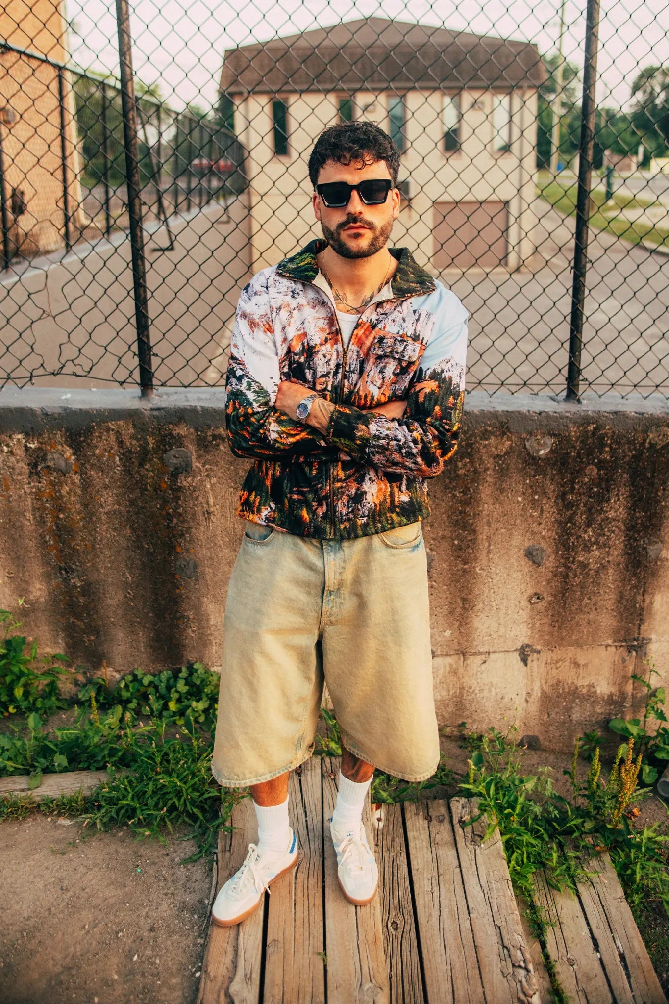 Urban outdoor setting with zipup shirt showcasing vibrant woodland design